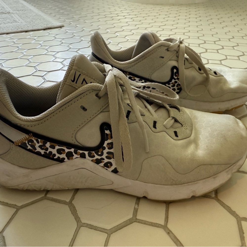 Nike White and Black Athletic Shoes with Leopard Print